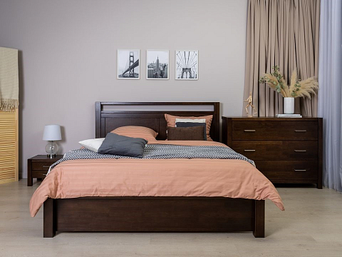 Черная кровать Fiord - Кровать из массива с декоративной резкой в изголовье.